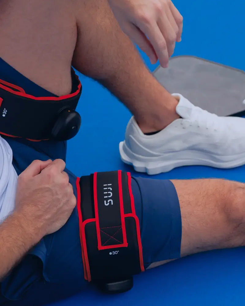 Close-up of a Suji cuff worn on the upper leg.